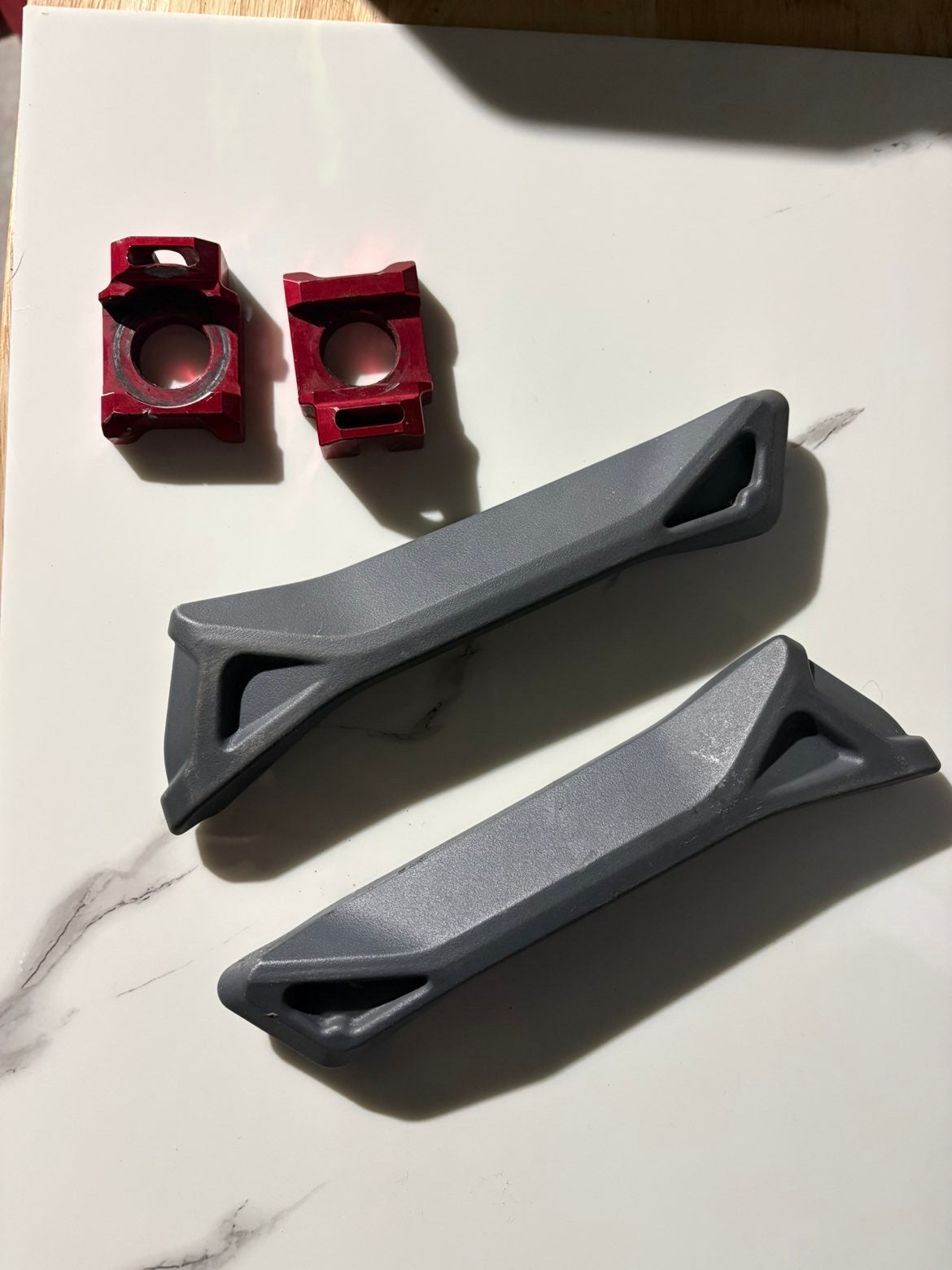 Surron Ultrabee Battery Bars/Axle Blocks - used
